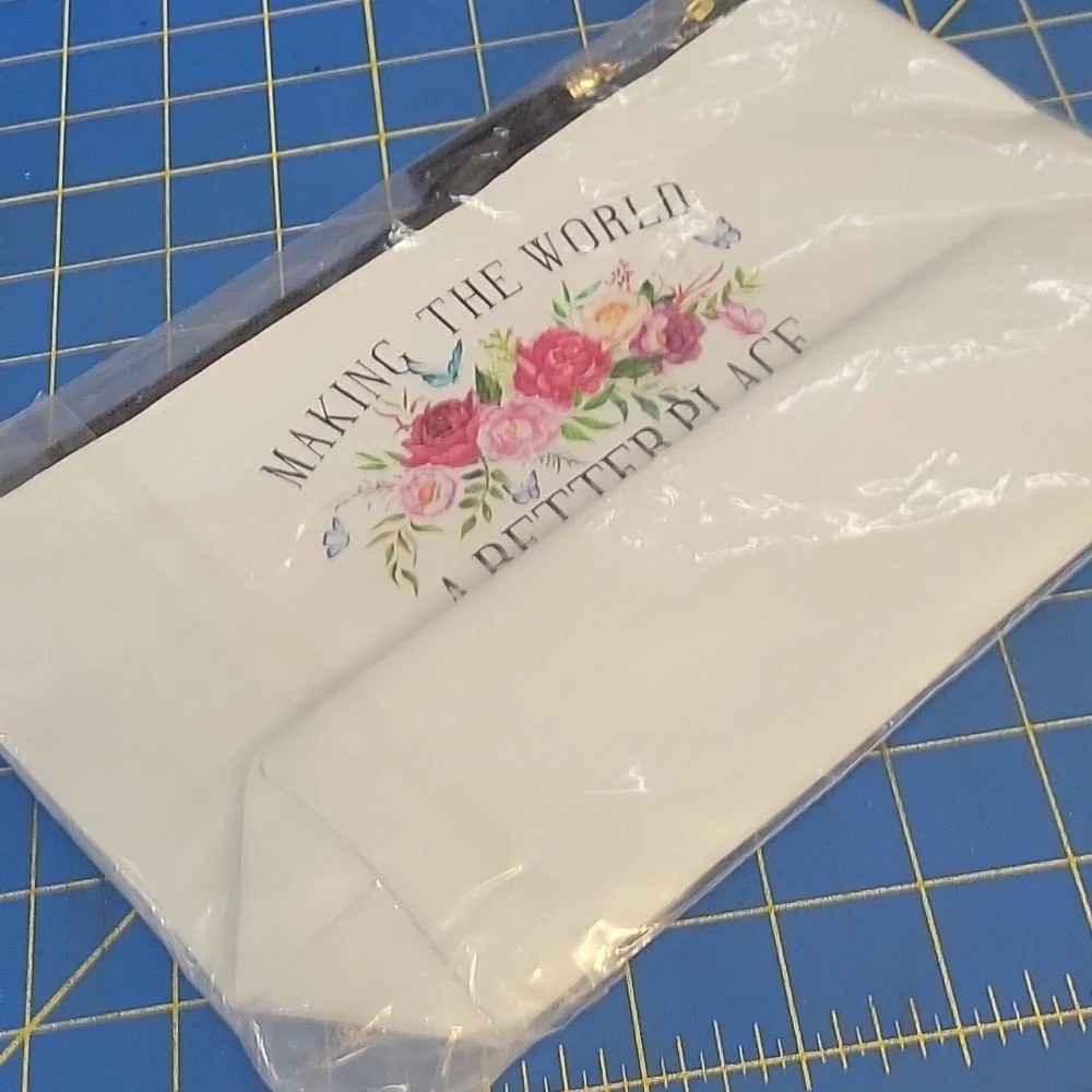 White Floral Print Pleather Pouch Making The World A Better Place Since 1985
